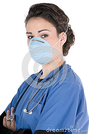 Young nurse, blue scrubs, mask, stethoscope Stock Photo