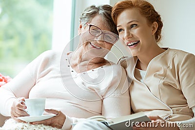 Young nurse and elder patient Stock Photo