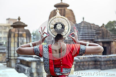 Young odissi female artist shows her inner beauty at Mukteshvara Temple,Bhubaneswar, Odisha, India Stock Photo