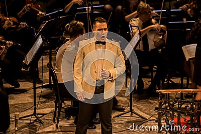 Young opera singer performing aria at National Theater in Belgrade Editorial Stock Photo