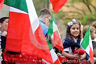 Young participants holding Italian flag at the annual Columbus Day parade in New York City, USA Editorial Stock Photo