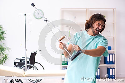 Young male patient in blood transfusion concept Stock Photo