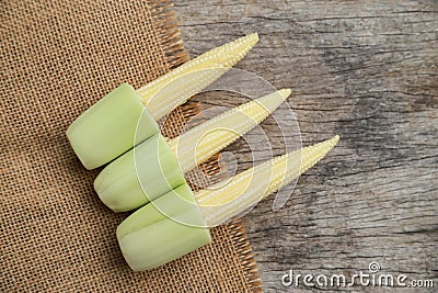 Young peeling corn from organic farm for being cooking ingredient of food Stock Photo
