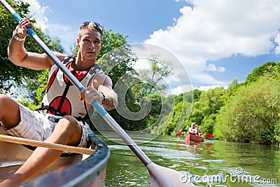 Young People Canoeing Stock Photo