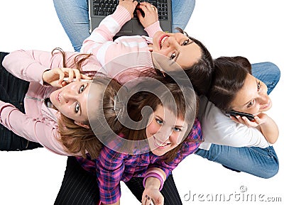 Young people with cellphones and laptop Stock Photo