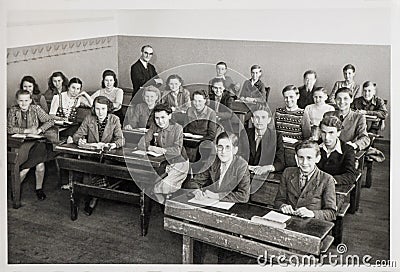 Young people classmates teacher classroom Vintage photo Editorial Stock Photo