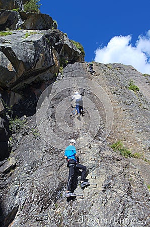 Young people climbing Editorial Stock Photo