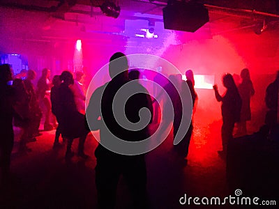 Young people dancing in club Stock Photo