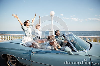 Young people driving a car Stock Photo