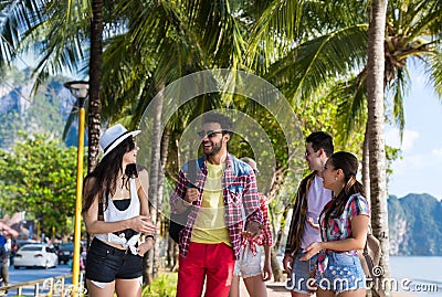 Young People Group Tropical Beach Palm Trees Friends Walking Speaking Holiday Sea Summer Vacation Stock Photo