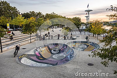 young people have fun at the bike park at the river Rhone promenade. Editorial Stock Photo