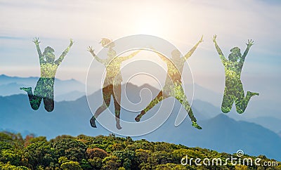Young people are jumping with joy in the midst of the wild nature.concept Environmental day earth Stock Photo