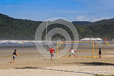 Young people relax on the beach of the Atlantic Ocean in Brazil and play beach volleyball Editorial Stock Photo