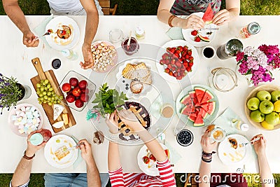 Young people sharing food Stock Photo