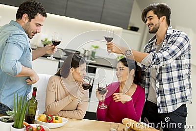 Young people sitting by the table Stock Photo