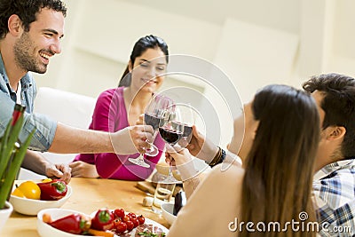 Young people sitting by the table Stock Photo