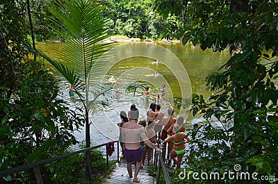 Young people swim in Babinda Boulders in Queensland Australia Editorial Stock Photo