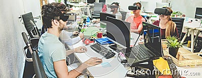 Young people using virtual reality glasses in coworking office - Teamwork creating new digital contents - Technology trends, Stock Photo