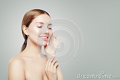 Young perfect girl relaxing. Beautiful girl with healthy skin, eyes closed. Facial treatment, skincare and cosmetology concept Stock Photo
