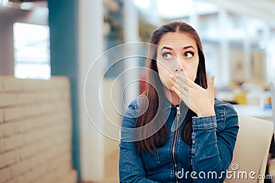 Woman Sitting in a Restaurant Feeling Sick and Nauseated Stock Photo