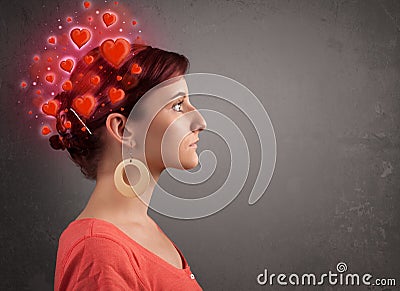 Young person thinking about love with red hearts Stock Photo