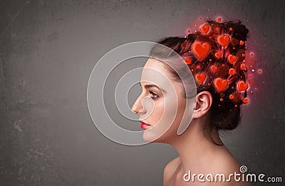 Young person thinking about love with red hearts Stock Photo