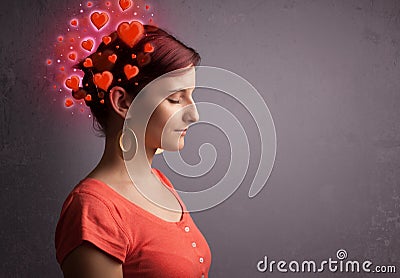 Young person thinking about love with red hearts Stock Photo