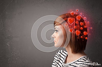 Young person thinking about love with red hearts Stock Photo