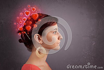 Young person thinking about love with red hearts Stock Photo