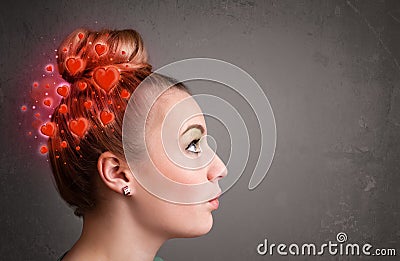 Young person thinking about love with red hearts Stock Photo