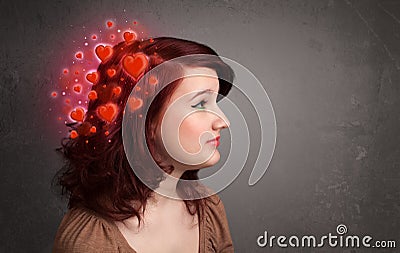 Young person thinking about love with red hearts Stock Photo