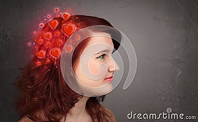 Young person thinking about love with red hearts Stock Photo