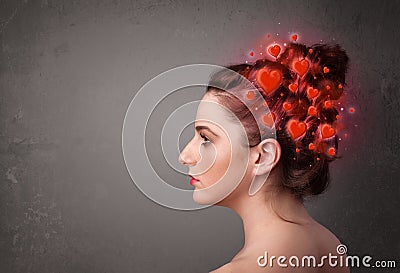 Young person thinking about love with red hearts Stock Photo