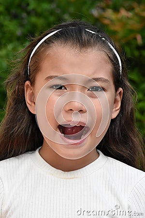 Young Philippina Female And Anger Closeup Stock Photo