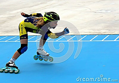 Young player on the roller skating track Editorial Stock Photo