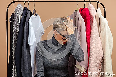 Young pleasant woman is fedding up shopping. close up shot Stock Photo