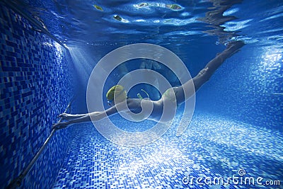 Young pregnant woman in swimming pool Stock Photo