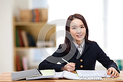 Young pretty Asian student. Stock Photo