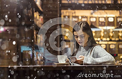 Girl Talking by Phone in Cafe Stock Photo