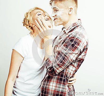 Young pretty couple, lifestyle people concept: girlfriend and boyfriend cooking together, having fun, making mess Stock Photo