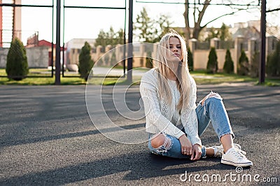 Young pretty fashionable blonde Stock Photo