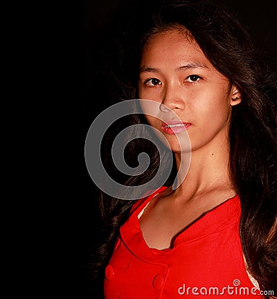 Young pretty Filipina model looking at the camera Stock Photo