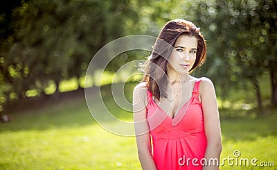 Young pretty girl in park in spring Stock Photo