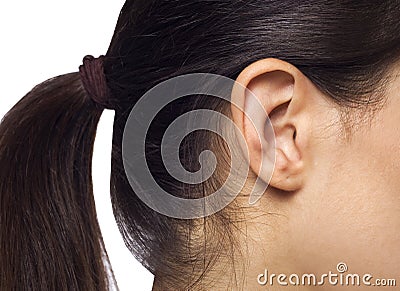 Young pretty woman ear closeup Stock Photo