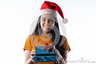 Young pretty woman holding boxes of presents. White background Stock Photo