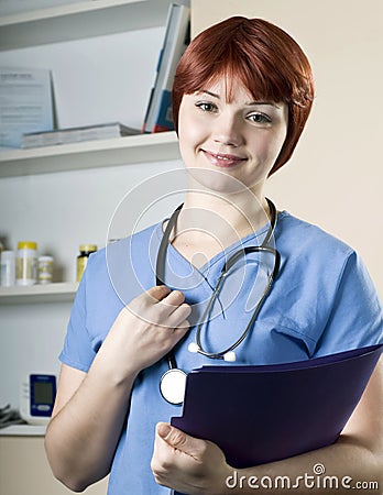 Young pretty woman nurse at hospital Stock Photo