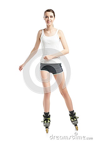 Young pretty woman on roller skates Stock Photo
