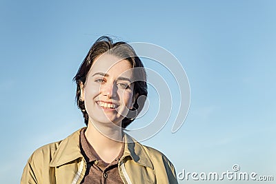 Young pretty woman with short hair smiling Stock Photo