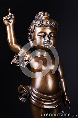 Young prince Siddhartha Gautama bronze statue. Stock Photo