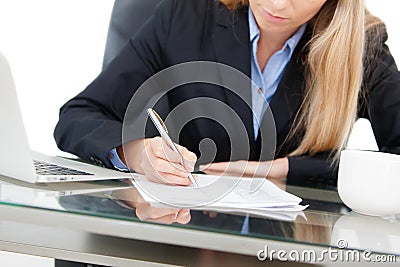 Young professional business woman working at desk Stock Photo
